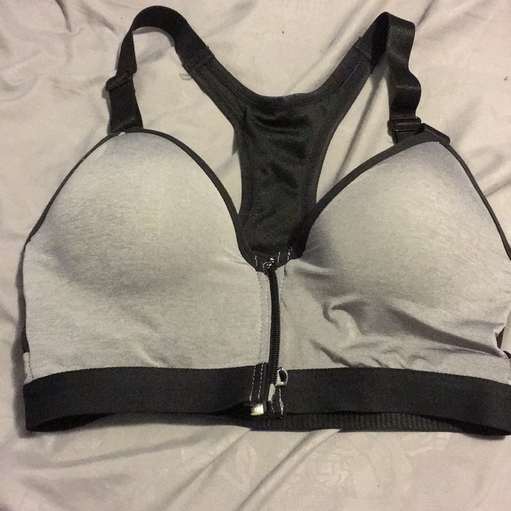 Grey and black zip up sports bra